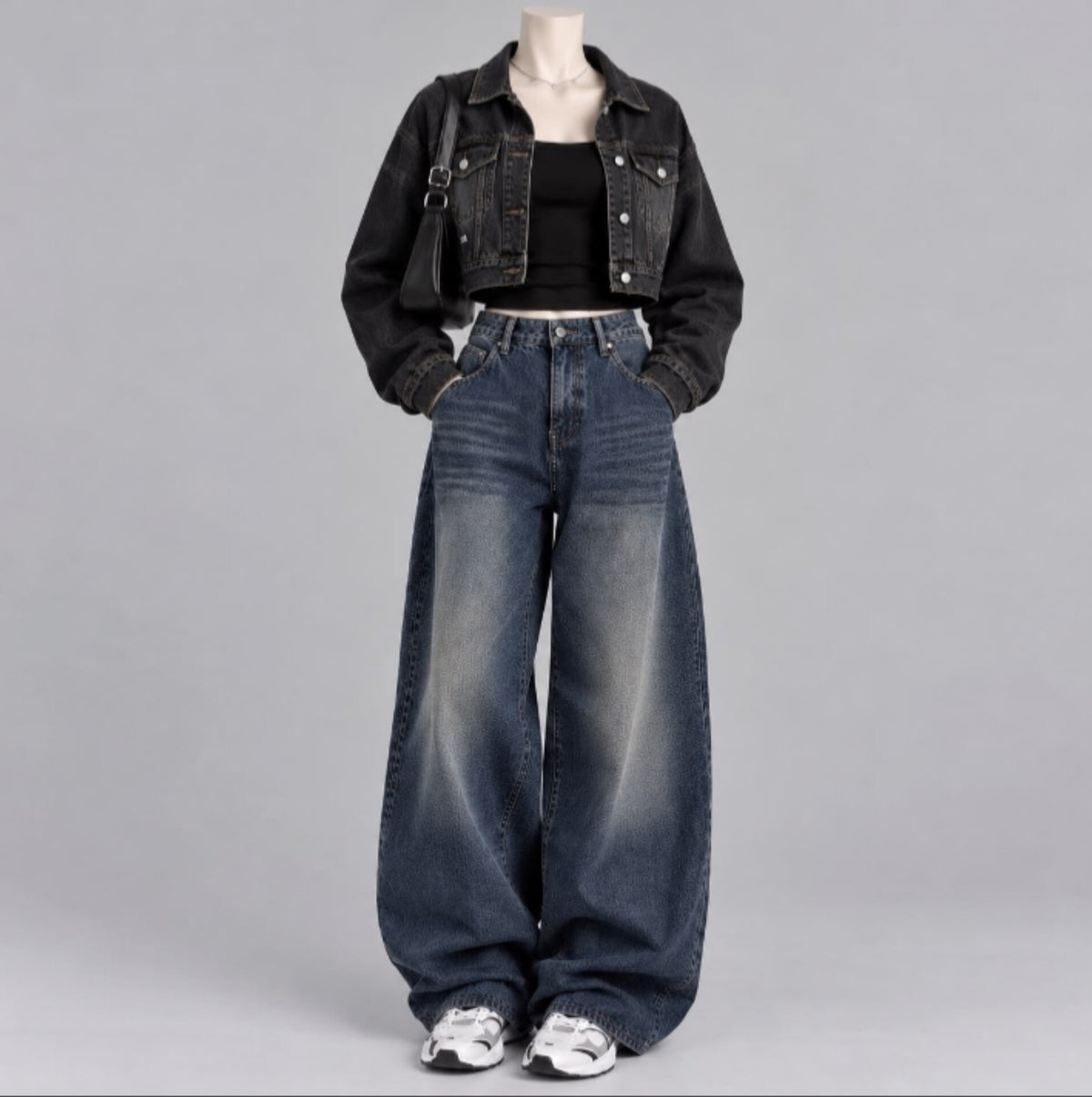 BLACK DENIM JACKET WITH BLACK TANK TOP AND DARK MID BLUE FADED JEANS